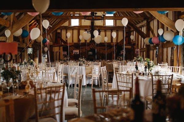 Inside of main barn decorated for a wedding at Rumbolds Farm, Billingshurst, West Sussex